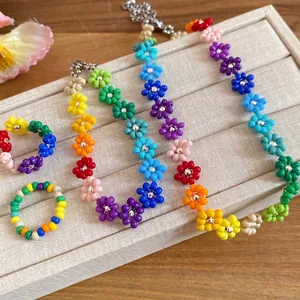 Bohemian style colorful handmade beaded flower necklace with matching rings set
