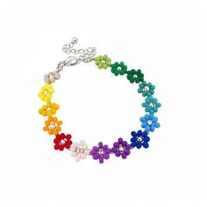 Colorful Bohemian flower beaded necklace with rhinestone centers and silver chain