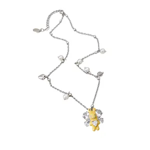 Charming silver necklace featuring a yellow enamel rabbit pendant with pearls and crystals