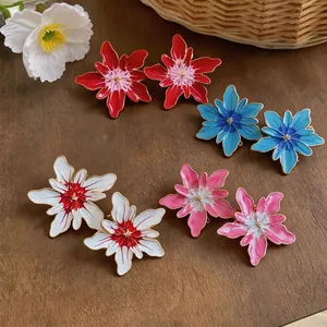 Elegant colorful enamel flower stud earrings set in red blue white and pink colors