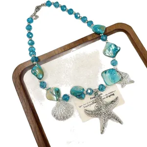 Bohemian blue shell and starfish pendant necklace for beach vacation outfits