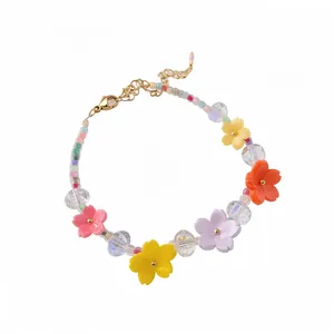 Braccialetto colorato con perline di dopamina e dolci ciondoli a fiore in resina da donna