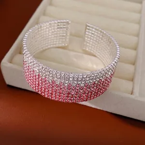 Wide multi-layer rhinestone cuff bracelet with pink gradient and elastic open design