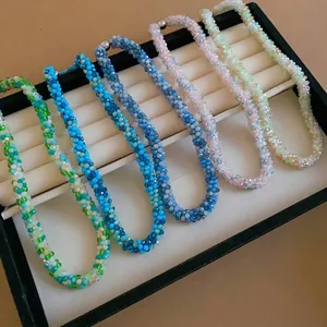 Set of elegant hand-woven crystal beaded necklaces in various vibrant pastel colors