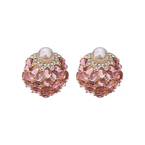 Retro palace style earrings with pink crystal stones and white pearl studs