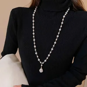 Vintage Baroque style imitation pearl long necklace with irregular pendant for women