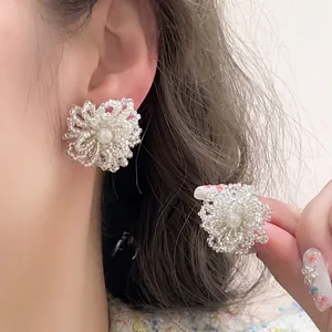 Elegant Korean style handmade beaded flower stud earrings with a central pearl accent