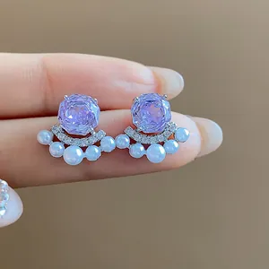 Exquisite purple zircon flower stud earrings with elegant small pearls and a silver finish detail