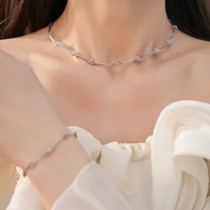 Elegante zilveren geweven kralenketting en bijpassende armband set voor dames