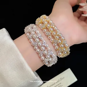 Elegant vintage multi-layer pearl and zircon flower bracelets available in gold and silver finishes