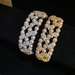 Elegant multi-layer pearl and zircon flower bracelets in gold and silver finish