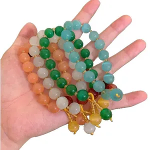 Handcrafted Chinese style colorful cat's eye stone beaded bracelets with tassel detail