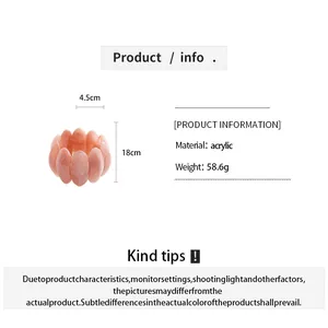 Detailed view of pink marbled acrylic bracelet with material and size specifications.