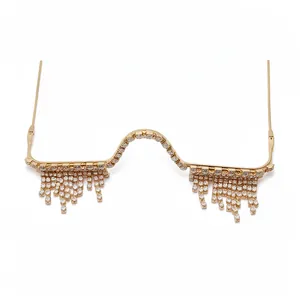 Fashionable gold glasses frame with sparkling rhinestone tassels, lensless retro jewelry accessory