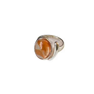 Elegant silver adjustable ring for women with unique oval orange marble dye stone