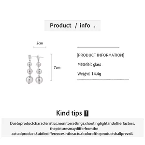 Infos détaillées sur la taille et le matériau des boucles d'oreilles en verre rond