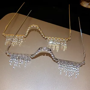Close-up detail of silver and gold rhinestone fringe eyeglass frames without lenses.