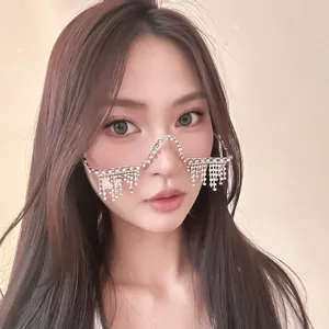 Close-up of a fashionable rhinestone tassel lensless glasses frame on a model's face.