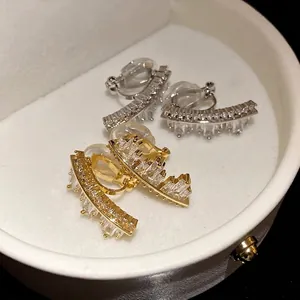 Exquisite zircon irregular geometric ear clips in polished gold and silver finishes