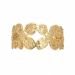 Elegant gold floral open bangle bracelet featuring intricate leaf patterns for women
