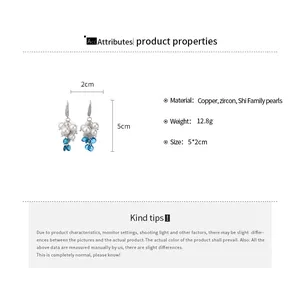 Specifiche dimensionali e dettagli materiali per orecchini di perle e zirconi.