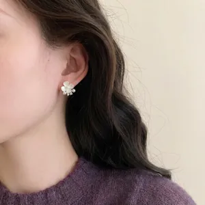 Elegant white enamel flower stud earrings with small pearls and crystals for women