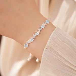 Elegant silver bracelet featuring zircon stars with an adjustable drawstring closure