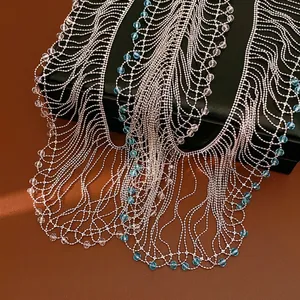 Elegant silver fringe necklace with blue glass beads in court style design