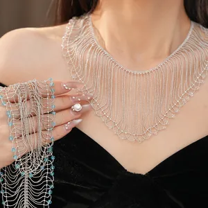 Close-up of luxury glass bead tassel necklace with intricate silver chain fringe