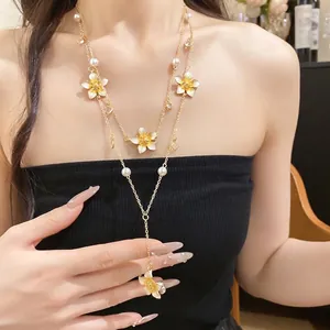 Floral Y-shaped double layer necklace with yellow enamel flowers and imitation pearls