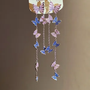 Elegant silver needle butterfly tassel earrings with sparkling pink and blue zircons