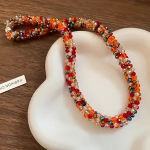 Handmade chunky rainbow seed bead woven necklace featuring vibrant bohemian colors