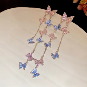 Elegant silver butterfly tassel earrings with pink and blue zircon crystals
