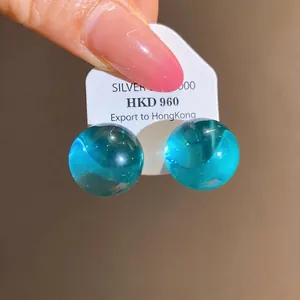 Elegant minimalist transparent blue resin ball stud earrings with silver needles for women