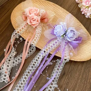 Romantic purple and pink lace flower hair clips with elegant bow and bead tassels.