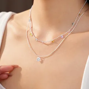 Collana a doppio strato argentata con frange in zirconi colorati e grande pendente