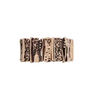 Vintage irregular geometric metal bracelet with textured gold-tone antique finish