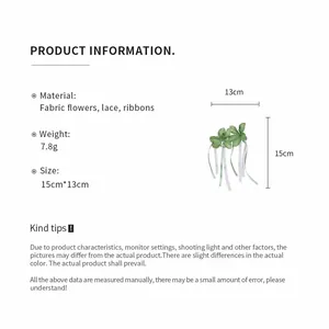 Spécifications du clip à fleurs en tissu vert avec détails en dentelle et rubans fins