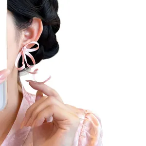 Elegant pink anti-gravity silk bow earrings with a unique new Chinese style aesthetic