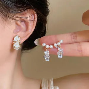 Detailed view of elegant French-style pearl and zircon tassel earrings for women