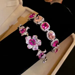 Elegante Ohrringe mit rosa Zirkonia-Blumen und S925-Silbernadel im Vintage-Modestil.