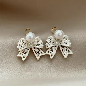 French Vintage Hollow Bow Stud Earrings With Artificial Pearl And Rhinestone Elegant Fashion Jewelry For Women