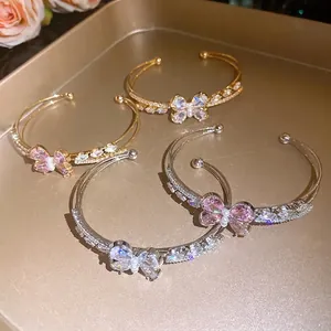 Elegant zirconia butterfly double-layer open bangle available in gold and silver
