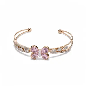 Elegant rose gold double-layered cuff bracelet featuring a pink zircon butterfly motif.