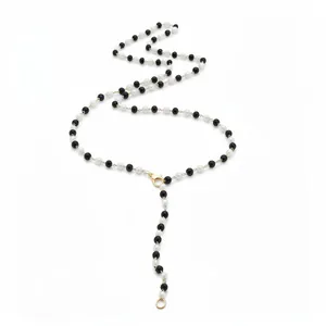 Elegant black and white pearl beaded lariat necklace with gold lobster clasp closure
