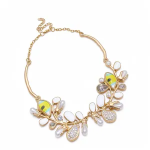 Luxury gold statement necklace with pearls, crystals and colorful enamel for summer holiday