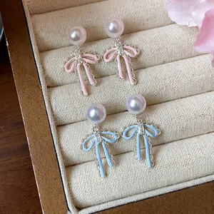Elegant French style zircon bowknot pearl stud earrings with silver needles for women