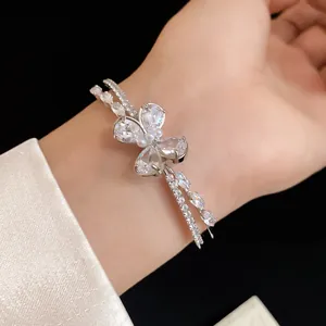 Elegant silver double-layer open bracelet featuring a sparkling zircon butterfly motif