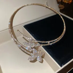 Sparkling rhinestone double-layered flower choker necklace in luxury gold finish