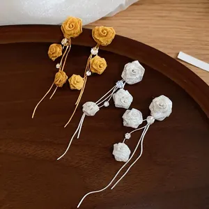 Elegant French style mesh rose flower tassel earrings with rhinestones, gold and white.